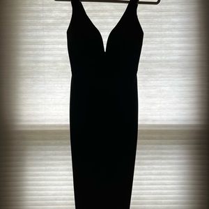 Lulus bodycon black dress - low neckline and double strap detail in the back